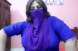 Hot unsatisfied Indian Desi aunty is horny added to talks about sex