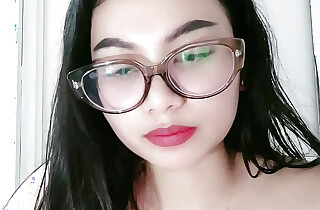 Woman crippling cleavage glasses