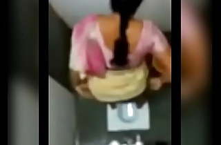 Desi aunty peeing in public toilet