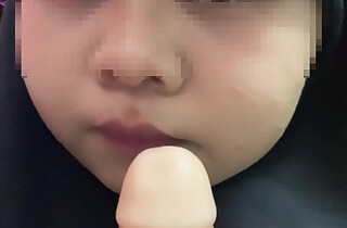 Hijabi malay sucking dildo