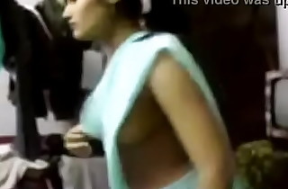 Bhabhi opens her saree and demonstrates her boobs to me