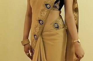 Hawt GIRL SAREE WEARING and Akin will not hear of Belly button and BACK
