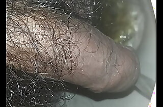 Hairy dong pissing