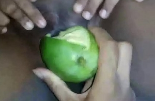 Bhabhi playing with herself using green mango