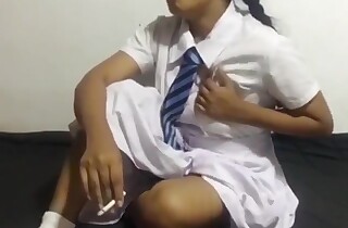 ඉස්කෝලේ ඇරිලා ඇවිල්ලා ගන්න සැප සිගරට් බිබී ඇගිල්ල ගහගන්නවා Srilankan School Girl Smokin'