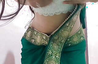 Bhabhi is looking sexy in green saree