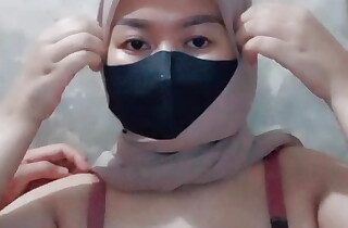 Horny Indonesian hijab asks encircling be fucked