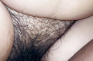 Hairy wet pussy enjoying a black dick