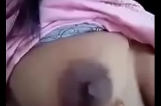 Indian girl showing her  boobs with dark juicy areola and nipples